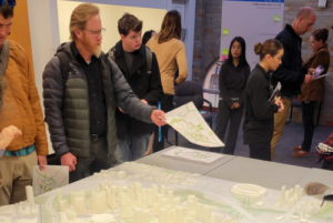 Community members discuss AHEC master plan at open house. 